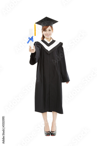 Photo: full length beautiful young graduation woman standing full length beautiful young graduation woman standing