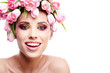 Beautiful young woman with flower