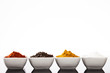 Photo: reihe kleiner schälchen mit paprika pfeffer curry und salz reihe kleiner schälchen mit paprika pfeffer curry und salz