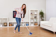 Young Woman Cleaning Floor
