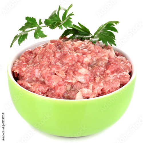 Photo: Bowl of raw ground meat isolated on white Bowl of raw ground meat isolated on white
