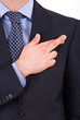 Business man with fingers crossed.