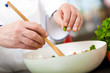 Foto: Chef preparing a salad Chef preparing a salad