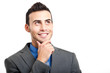 Smiling businessman looking up