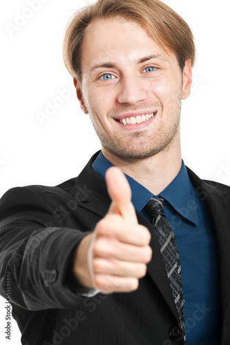 Photo: Smiling businessman thumbs up Smiling businessman thumbs up