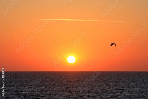 Photo: kitesurfer at sunset kitesurfer at sunset