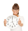 businesswoman with wall clock