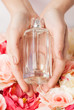 woman's hands showing perfume