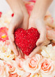 woman's hands holding heart