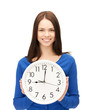 businesswoman with wall clock