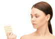 young woman with pills