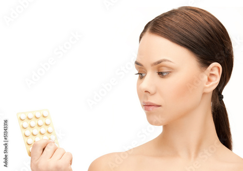 Photo: young woman with pills young woman with pills