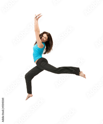 Photo: sporty woman jumping in sportswear sporty woman jumping in sportswear
