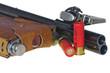 Double shotgun, knif, flask and red cartridges. A rest on a whit