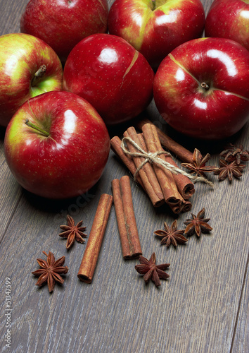 Photo: Fresh red apples with cinnamon and anise Fresh red apples with cinnamon and anise