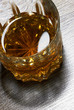 whiskey in glasses on wooden