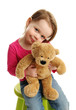 Photo: Sweet girl holding a teddy bear Sweet girl holding a teddy bear