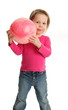 Photo: Young girl playing with a toy ball Young girl playing with a toy ball