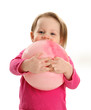 Photo: Little girl hugging a ball Little girl hugging a ball