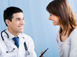 Portrait of smiling doctor and female patient