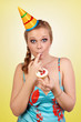 Foto: bautiful caucasian girl blowing candles on her cake bautiful caucasian girl blowing candles on her cake