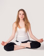 Photo: Pretty girl doing meditation exercise Pretty girl doing meditation exercise