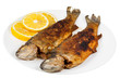 fried river trout fish on plate