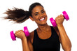 Happy fitness woman lifting dumbbells