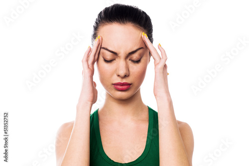 Photo: Asian woman having headache Asian woman having headache