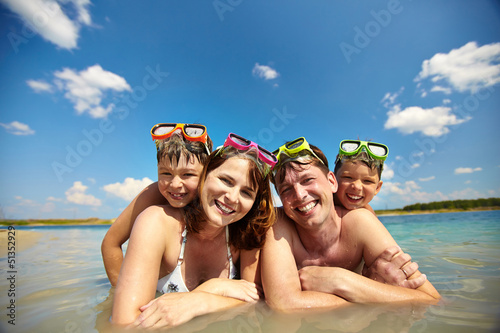 Photo: Sunbathers in water Sunbathers in water