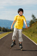 Boy rollerblading