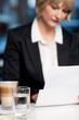Blur image of business lady in background
