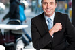 Handsome cheerful experienced businessman