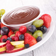 chocolate sauce and assorted of fruits