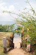 stairway entry to sandy beach  flowers Caribbean Sea Little Corn