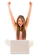 Woman with a laptop celebrating