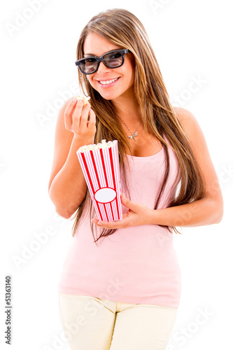 Photo: Woman eating popcorn Woman eating popcorn