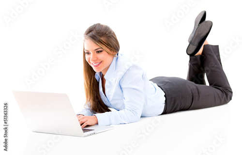 Photo: Business woman lying on the floor Business woman lying on the floor