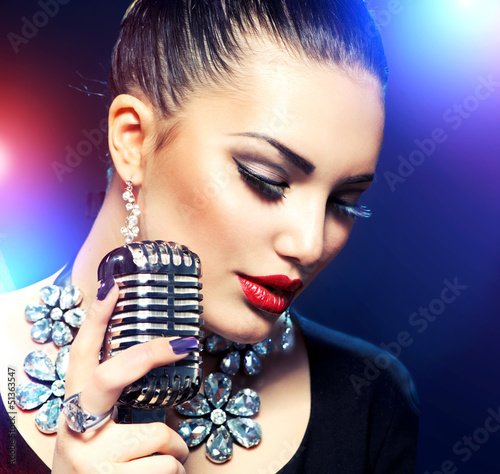 Photo: Singing Woman with Retro Microphone Singing Woman with Retro Microphone