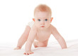 Cute baby with beautiful blue eyes on the white bed