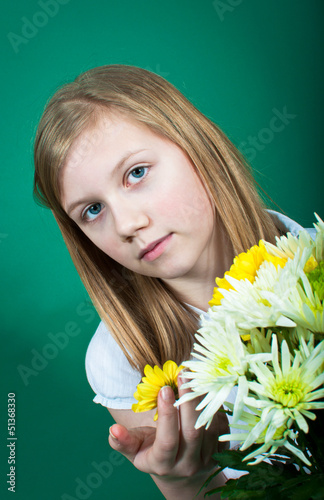 Photo: Pretty girl with summer flowers Pretty girl with summer flowers