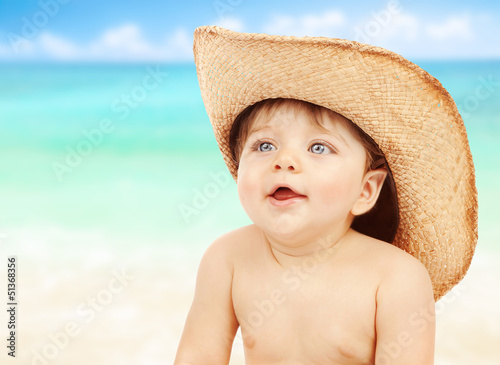 Photo: Little naked cowboy on the beach Little naked cowboy on the beach