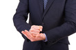 Businessman gesturing with both hands.
