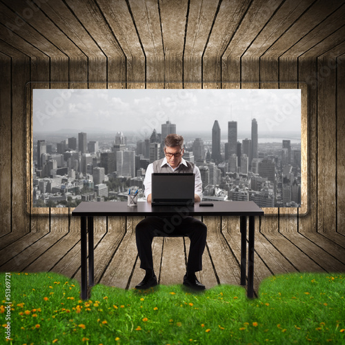 Photo: Businessman working with laptop. Businessman working with laptop.