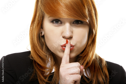 Photo: business woman with silence sign isolated business woman with silence sign isolated