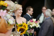 Wedding guests toasting bride and groom
