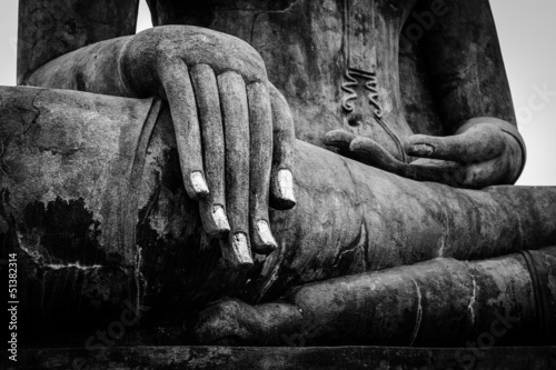 Photo: Buddha statue hand close up detail Buddha statue hand close up detail