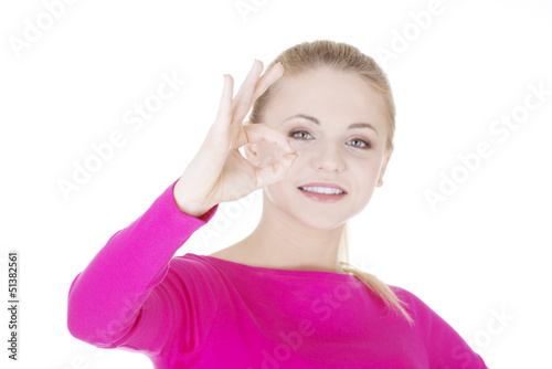 Photo: Happy teen girl gesturing perfect Happy teen girl gesturing perfect