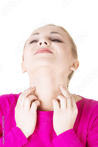 Photo: Young beautiful woman scratching her self. Young beautiful woman scratching her self.