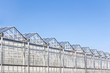 Green house with blue sky